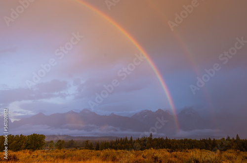 Storm Clouds and Rainbow over the Tetons in Autumn
