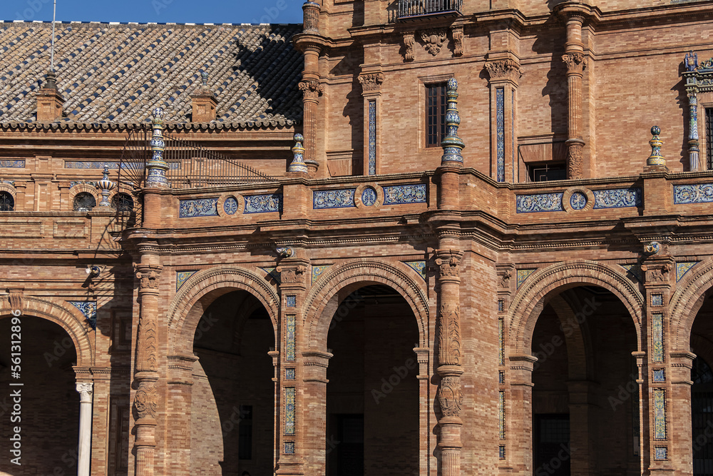 Obraz premium Architectural details of the picturesque renaissance and Moorish building styles in the Spain square (Plaza de Espana). Seville, Andalusia, Spain.