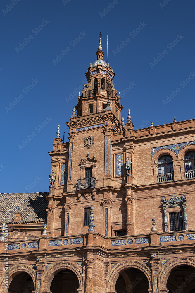 Architectural details of the picturesque renaissance and Moorish building styles in the Spain square (Plaza de Espana). Seville, Andalusia, Spain.