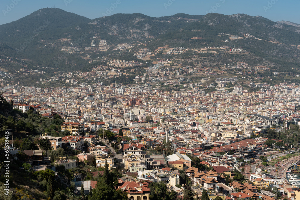 Aerial view of Alanya city set on the slopes the Taurus Mountains, Turkey.