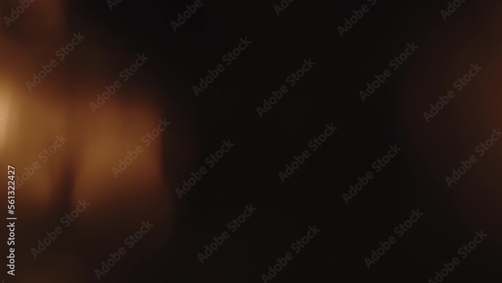 Real orange light leaks on black background Real orange light leaks on black background