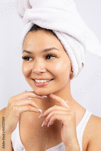 skincare skin care model towel white background face wash l'oreal lush smile clean washing	
