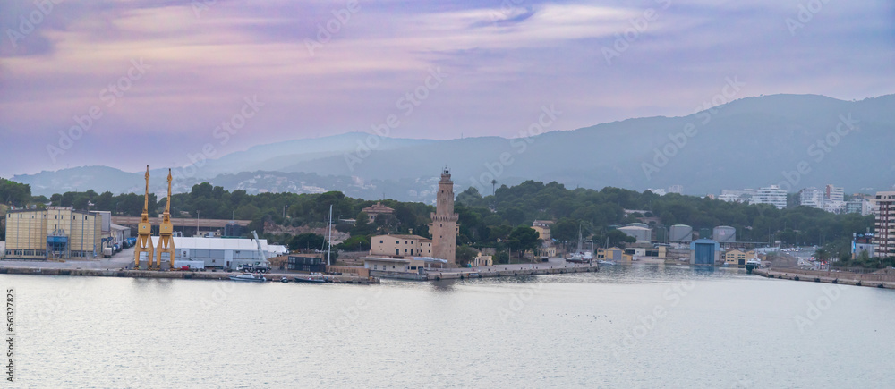 Mallorca, Spain - October 22, 2022, Port Alcudia in the early evening, view of the city from the sea in Mallorca