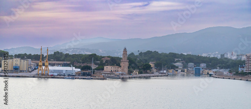 Mallorca, Spain - October 22, 2022, Port Alcudia in the early evening, view of the city from the sea in Mallorca