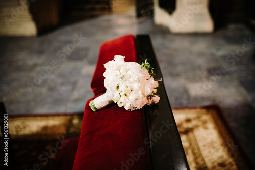 Wedding flowers bouquet bridal white rose simple minimal  in church decoration ceremony kneeler bride