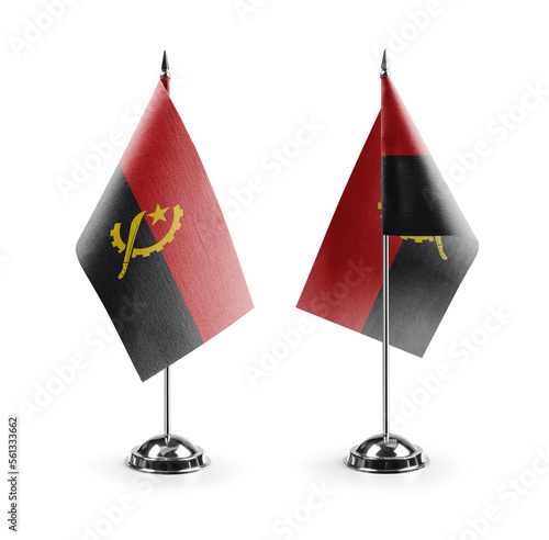 Small national flags of the Angola on a white background photo