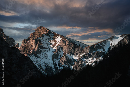 Canvas Print Snow covered mountains in winter, in austrian alps at sunset.