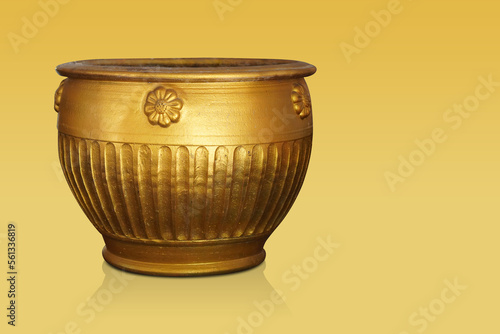antique gold ceramic pot on yellow background, vintage, retro, antique, old, decor, copy space