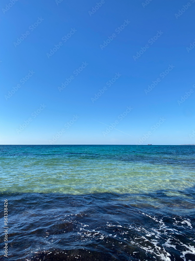 Obraz premium Small ripples on the water. Blue water of the Mediterranean Sea. February, Cyprus.