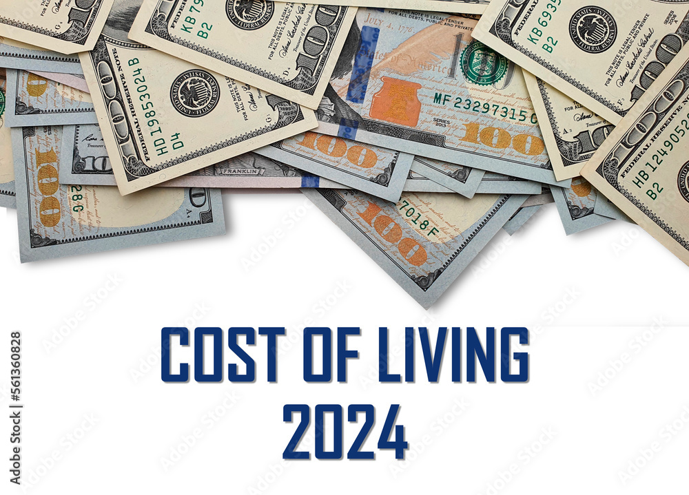 The inscription "cost of living 2024" on the background of banknotes