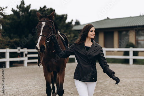 Horse riding. A young woman with a horse. © callisto