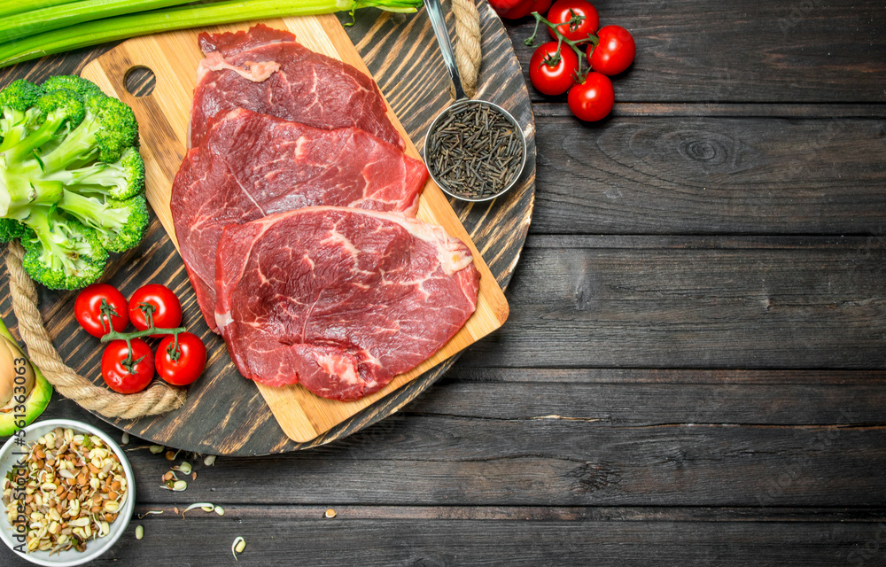 Healthy food. Raw beef meat with organic food assortment . Healthy food. Raw beef meat with organic food assortment .