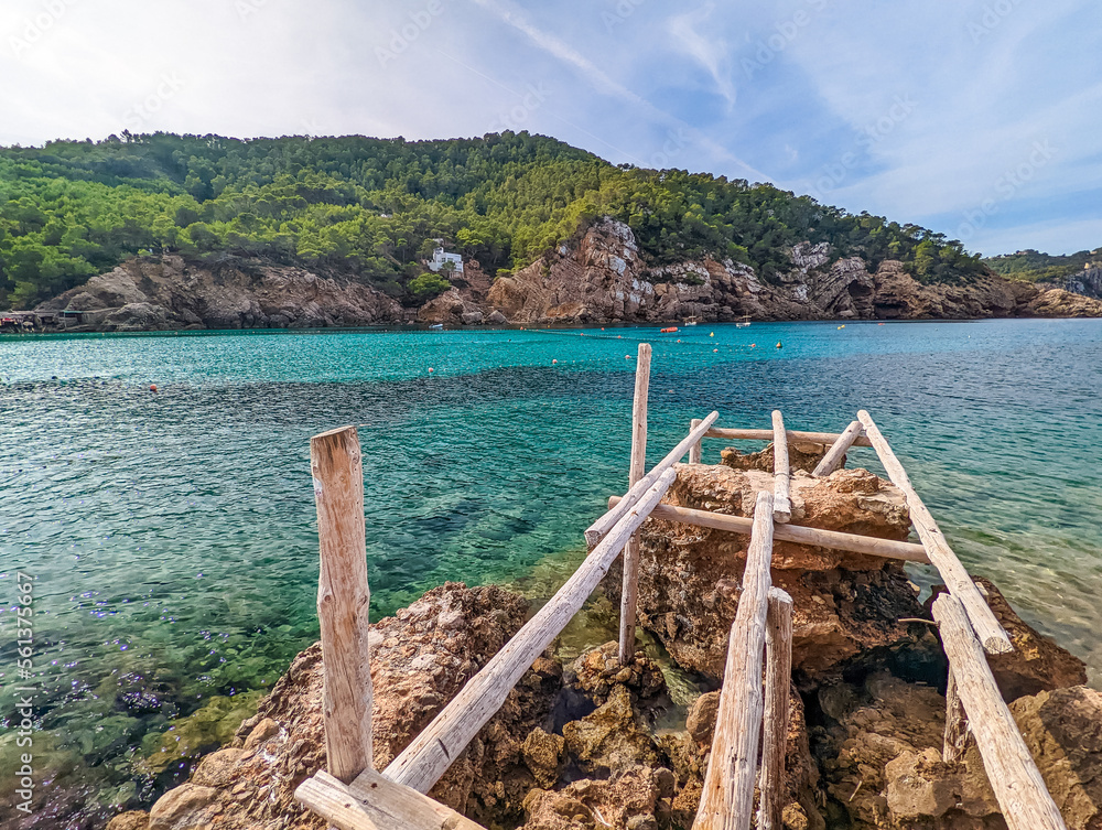 Cala Benirras beach with turquoise sea water, Ibiza island, Spain Cala Benirras beach with turquoise sea water, Ibiza island, Spain