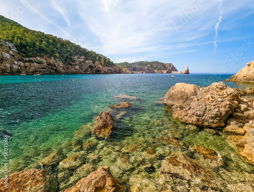 Cala Benirras beach with turquoise sea water, Ibiza island, Spain photo