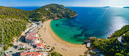 Ibiza, Balearics, Spain - Cala de San Vincente or Sant Vincent, bay with beach photo