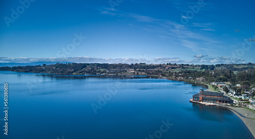 Frutillar chilean town seen by a drone - Panorma Pier in the middel of blue water photo