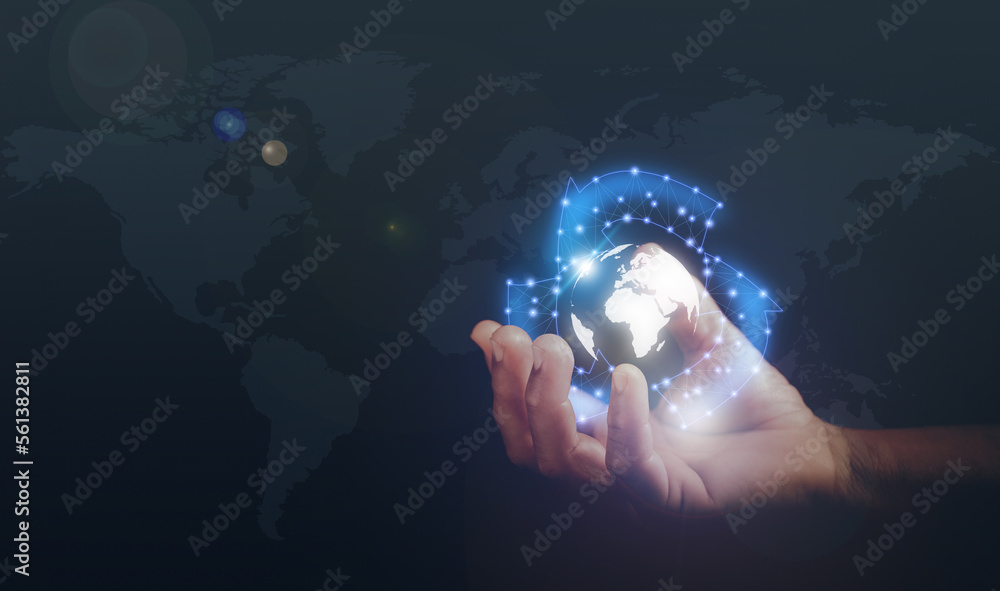Hand holding recycle icon with virtual earth in hand and world map ...
