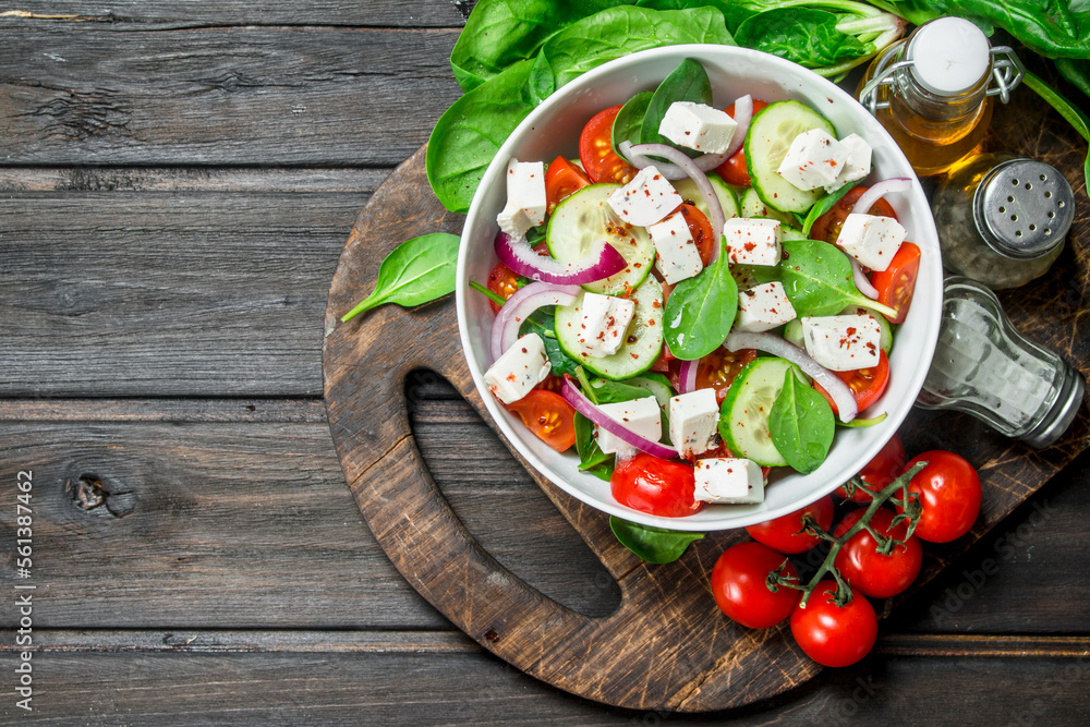 Vegetable salad. Salad with vegetables, cheese and olive oil. Vegetable salad. Salad with vegetables, cheese and olive oil.