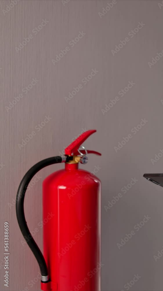 Male Professional Checking A Fire Male Professional Checking A Fire