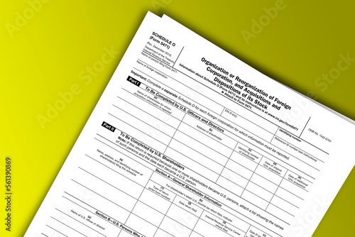 Form 5471 (Schedule O) documentation published IRS USA 12.21.2012. American tax document on colored