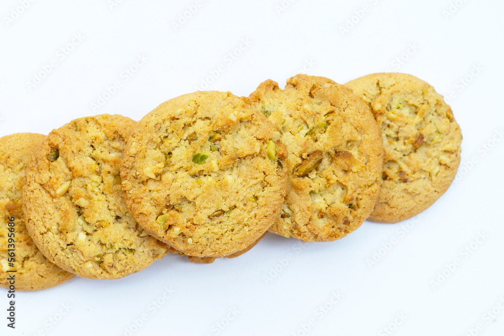 pistachio and almond cookies on white background. pistachio and almond cookies on white background.