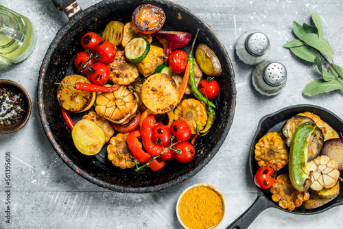 Assortment of grilled vegetables with spices and herbs.