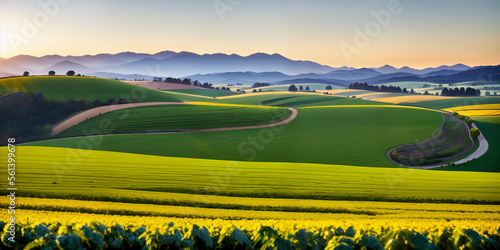  farm in farmland with a field of flowers and mountains in the background, with rolling hills and immaculate rows of crops. © G-IMAGES