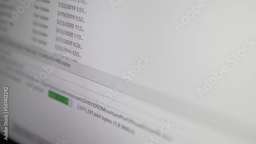 Screen of a modern digital device that displays file upload or download bar progress. Modern technologies.exchange or transfer of information.high speed internet, selective focus