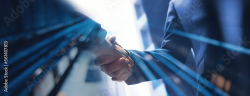 Businessmen making handshake with partner, greeting, dealing, merger and acquisition, business cooperation concept, for business, finance and investment background, teamwork and successful business photo