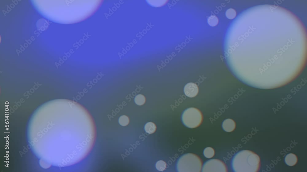 Falling big round glitters and particles on blue and fashion background, motion holidays and winter style for Happy New Year and Merry Christmas Falling big round glitters and particles on blue and fashion background, motion holidays and winter style for Happy New Year and Merry Christmas