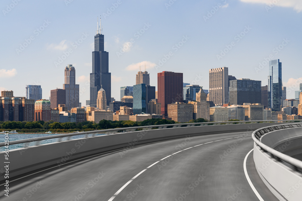 Empty urban asphalt road exterior with city buildings background. New modern highway concrete construction. Concept of way to success. Transportation logistic industry fast delivery. Chicago. USA. Empty urban asphalt road exterior with city buildings background. New modern highway concrete construction. Concept of way to success. Transportation logistic industry fast delivery. Chicago. USA.