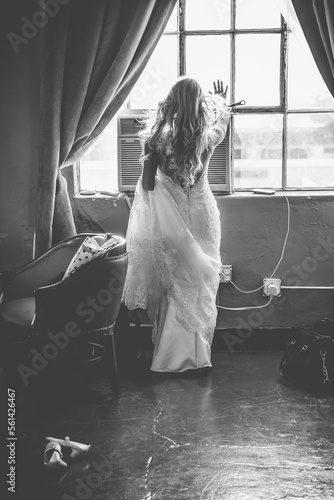 Bride walking back of wedding dress