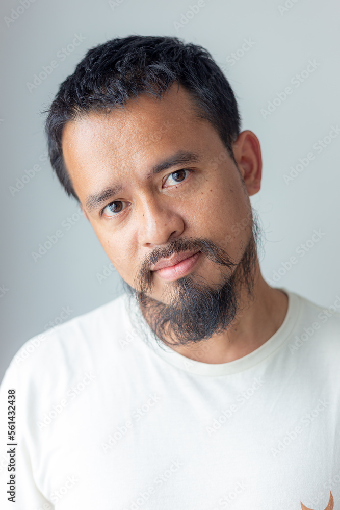 Fototapeta premium Smart asian mustard man wear shirt on white background