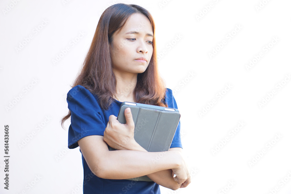 Businesswoman looking at laptop computer screen desperately losing business Businesswoman looking at laptop computer screen desperately losing business
