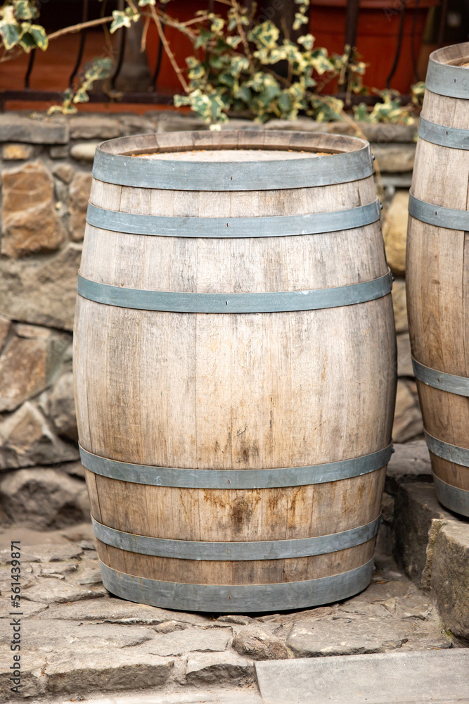 Empty wooden wine barrels on the street