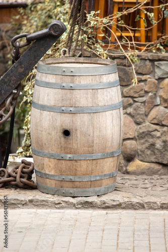 Empty wooden wine barrels on the street © Prikhodko