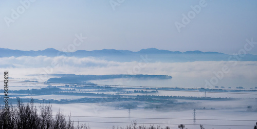 Temperature inversion forms cloudsea in snowy town and lake (Inawashiro, Fukushima, Japan) © Mayumi.K.Photography