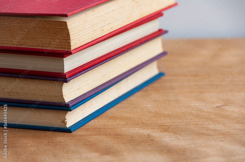 Books on wooden table with customizable space for text or ideas. Copy space and education concept. Books on wooden table with customizable space for text or ideas. Copy space and education concept.
