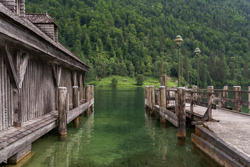 Jetty at Königssee, a natural lake in the extreme southeast Berchtesgadener Land district of the German state of Bavaria, near the Austrian border. Jetty at Königssee, a natural lake in the extreme southeast Berchtesgadener Land district of the German state of Bavaria, near the Austrian border.