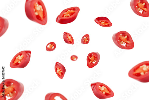 Photo Falling sliced red hot chilli peppers isolated on white background, selective fo