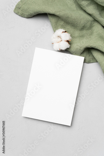 Invitation, flyer or greeting card mockup with cotton flowers