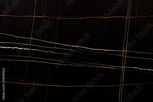 Sahara Noir Marble background, top texture for effect dark design look. Slab photo. Dark black matt material slate backdrop for exterior, luxury home decoration, 3d floor tiles, ceramic wall surface. photo