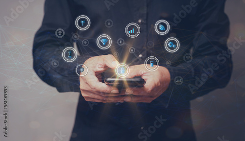 Businessman using smartphone mobile technology global internet connection for business and digital marketing finance and banking digital communication technology big data and analytics