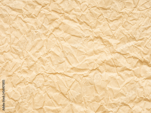 Extra soft beige or yellow crumpled paper texture. Blank grunge page or sheet for interior and exterior decoration. Empty background for handcrafts, xmas designs, text, lettering, screen saver.