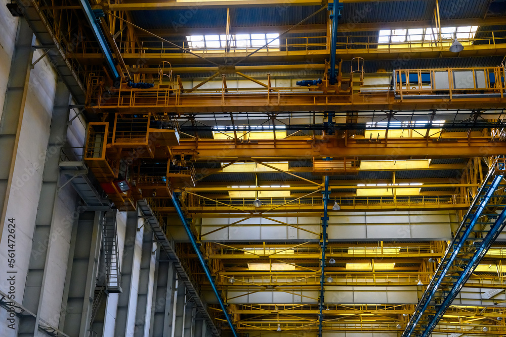 The overhead crane and scaffolding. at an aircraft factory.