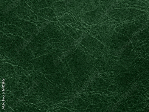 Green luxury quality leather, natural material with design lines pattern. Use as wallpaper or backdrop luxury event, design upholstered furniture, clothing. Genuine soft brown leather texture closeup.