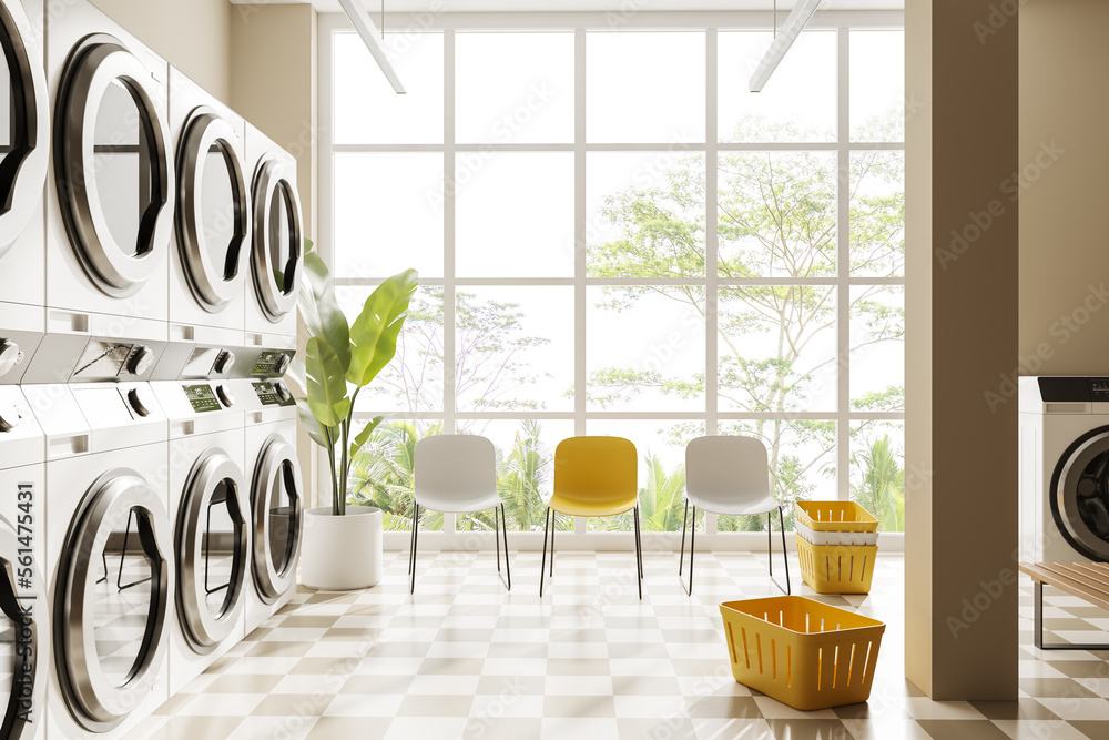 Light laundry interior with washing machines and chairs near panoramic window - obrazy, fototapety, plakaty 