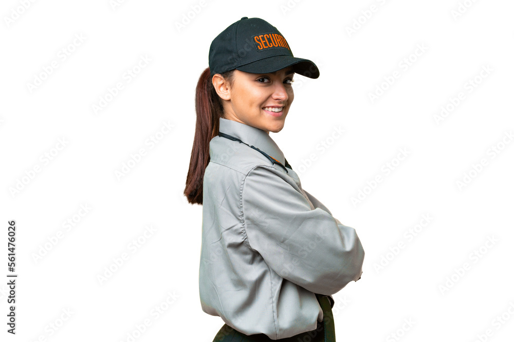 Young safeguard woman over isolated chroma key background with arms crossed and looking forward Young safeguard woman over isolated chroma key background with arms crossed and looking forward