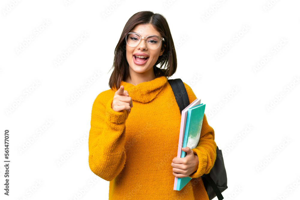 Young student woman over isolated chroma key background surprised and pointing front Young student woman over isolated chroma key background surprised and pointing front