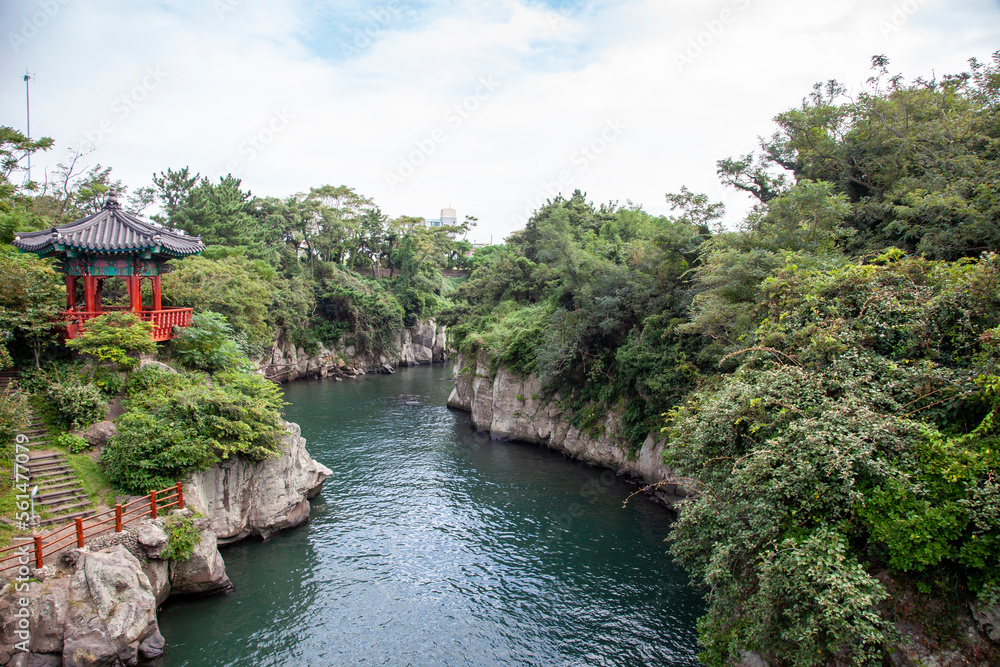 Beautiful view of the Korean pavilion beside the river in Jeju Island, South Korea Beautiful view of the Korean pavilion beside the river in Jeju Island, South Korea